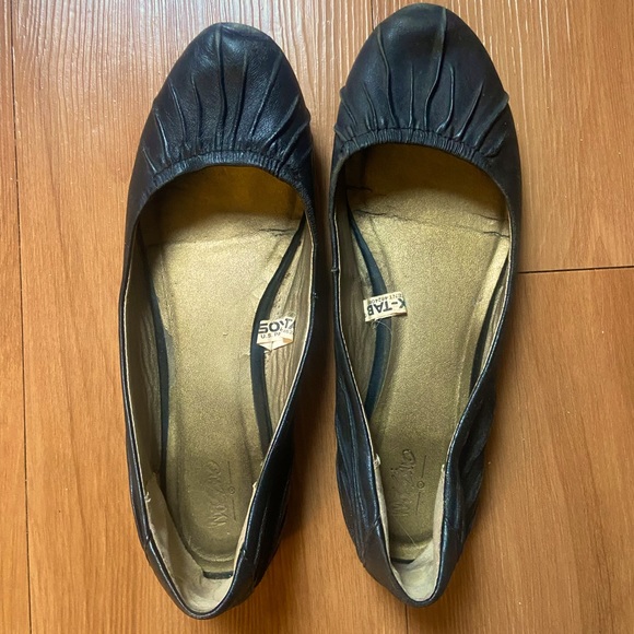 Well worn black ballerina flats. - Picture 2 of 3